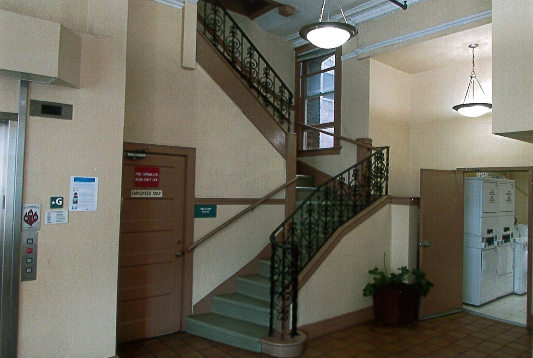 Lobby main stairs, partial view of elevator